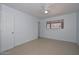 This bedroom features neutral paint, a ceiling fan, and a window with blinds at 2922 W Citrus Way, Phoenix, AZ 85017