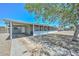 Charming single-story home with a covered carport, a screened porch, and low-maintenance landscaping at 2922 W Citrus Way, Phoenix, AZ 85017