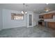 Dining area features a view into the newly updated kitchen with stainless steel appliances at 2922 W Citrus Way, Phoenix, AZ 85017