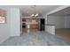 An open-concept kitchen and dining area featuring new stainless appliances and bright lighting at 2922 W Citrus Way, Phoenix, AZ 85017