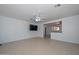 Inviting living room features tile floors, a ceiling fan, and an entertainment area at 2922 W Citrus Way, Phoenix, AZ 85017