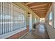 Covered screened porch featuring a ceiling with wood beams at 2922 W Citrus Way, Phoenix, AZ 85017