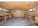 This utility shed features peg board, shelving and work benches at 2922 W Citrus Way, Phoenix, AZ 85017