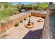 Private backyard featuring a brick patio, a charming water fountain, and a cozy outdoor seating area at 3030 N Saranac --, Mesa, AZ 85207