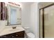 Bathroom features a sleek glass-enclosed shower, modern vanity, and fixtures, providing a comfortable and stylish space at 3030 N Saranac --, Mesa, AZ 85207