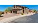 Beautiful two-story home featuring a two-car garage, desert landscaping and a brick-paved driveway at 3030 N Saranac --, Mesa, AZ 85207
