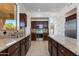 Modern kitchen featuring stainless steel appliances, granite countertops and tile floors at 3030 N Saranac --, Mesa, AZ 85207