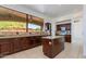 Gourmet kitchen boasting granite countertops, wooden cabinets, and modern appliances at 3030 N Saranac --, Mesa, AZ 85207