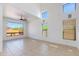 Bright living area featuring large windows and tile floors at 3030 N Saranac --, Mesa, AZ 85207