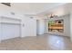 Bright living area with tile floors, a ceiling fan, and ample natural light at 3030 N Saranac --, Mesa, AZ 85207