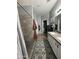 Beautiful bathroom featuring dual sinks, a shower, and stylish flooring at 30394 N Appalachian Trl, San Tan Valley, AZ 85143