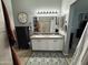 Bathroom showcasing dual sinks with granite countertops and a decorative rug at 30394 N Appalachian Trl, San Tan Valley, AZ 85143