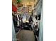 Walk-in closet features hanging storage, shelves, and a variety of organized clothing items at 30394 N Appalachian Trl, San Tan Valley, AZ 85143