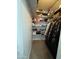 Walk-in closet featuring built-in shelving for efficient storage and organization at 30394 N Appalachian Trl, San Tan Valley, AZ 85143
