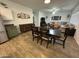 Dining area adjoining kitchen features tile floors and seamless layout to the living spaces at 30394 N Appalachian Trl, San Tan Valley, AZ 85143