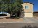 Well-maintained two-story home featuring a xeriscaped front yard and an attached two-car garage at 30394 N Appalachian Trl, San Tan Valley, AZ 85143