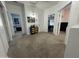 Second story hallway featuring neutral carpet and access to multiple rooms at 30394 N Appalachian Trl, San Tan Valley, AZ 85143