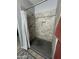 Tiled shower showcasing updated tile work and design at 30394 N Appalachian Trl, San Tan Valley, AZ 85143