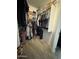 Organized walk-in closet with built-in shelves, hanging rods, and shoe racks at 30394 N Appalachian Trl, San Tan Valley, AZ 85143