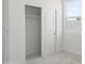 View of a well-lit bedroom with a closet with sliding doors and a window with a view at 3105 W Romana Dr, Eloy, AZ 85131