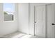 A bright room with a closet featuring sliding doors and a large window overlooking the backyard at 3105 W Romana Dr, Eloy, AZ 85131
