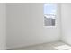 A bright bedroom with a large window overlooking the backyard at 3105 W Romana Dr, Eloy, AZ 85131