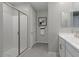 Modern bathroom featuring a glass-enclosed shower, sleek vanity, and contemporary finishes at 3310 E Valleyhigh Trl, San Tan Valley, AZ 85143