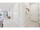 Inviting entryway featuring tile flooring, artistic wall decor, and convenient coat hooks at 3310 E Valleyhigh Trl, San Tan Valley, AZ 85143