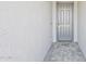 Modern front door with stone tile entryway at 3310 E Valleyhigh Trl, San Tan Valley, AZ 85143