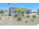 Stylish one-story home featuring desert landscaping and a welcoming entrance at 3310 E Valleyhigh Trl, San Tan Valley, AZ 85143