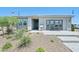 Charming single-story home showcasing modern architecture and desert landscaping at 3310 E Valleyhigh Trl, San Tan Valley, AZ 85143