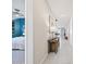 Bright hallway leads to the bedrooms and living areas, with stylish decor and lighting at 3310 E Valleyhigh Trl, San Tan Valley, AZ 85143
