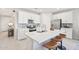 Modern kitchen with stainless appliances, white cabinets, and quartz countertop island at 3310 E Valleyhigh Trl, San Tan Valley, AZ 85143