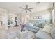 Inviting living room with modern furniture, ceiling fan and stylish decor at 3310 E Valleyhigh Trl, San Tan Valley, AZ 85143