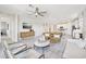 Bright living room features stylish furniture, neutral tones and an open floor plan at 3310 E Valleyhigh Trl, San Tan Valley, AZ 85143