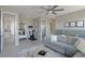 Cozy living room featuring a comfortable couch and stylish decor with access to other rooms at 3310 E Valleyhigh Trl, San Tan Valley, AZ 85143