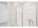 Modern glass enclosed shower with sleek fixtures and bright lighting, offering a luxurious feel at 3310 E Valleyhigh Trl, San Tan Valley, AZ 85143
