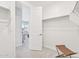 Spacious walk-in closet with open doorway, offering a glimpse into organized storage solutions at 3310 E Valleyhigh Trl, San Tan Valley, AZ 85143