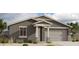 Charming single-story home with a neutral color palette, a two-car garage, and desert landscaping at 3322 E Valleyhigh Trl, San Tan Valley, AZ 85143