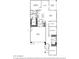 Open-concept floor plan showcasing a large kitchen, primary suite, bedrooms and a two-car garage at 5597 S 253Rd Ave, Buckeye, AZ 85326