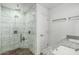 This main bathroom features a glass enclosed shower, marble accents, and granite vanity at 5709 S 13Th Ave, Phoenix, AZ 85041