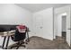 This bedroom offers carpet flooring and a closet, great for storage and organization at 5709 S 13Th Ave, Phoenix, AZ 85041