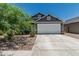 Charming single-Gathering home with a well-maintained front yard and two car garage at 5709 S 13Th Ave, Phoenix, AZ 85041