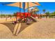 Vibrant community playground showcasing colorful slides and play structures for entertainment and recreation at 5709 S 13Th Ave, Phoenix, AZ 85041