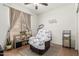 Cozy bedroom featuring a comfortable chair and soft, natural light perfect for relaxing at 609 S 122Nd Dr, Avondale, AZ 85323