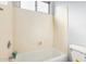 A simple yet functional bathroom featuring a tub and shower, with a toilet at 640 W Country Estates Ave, Gilbert, AZ 85233