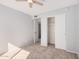 Bright bedroom with carpet and closet space at 640 W Country Estates Ave, Gilbert, AZ 85233
