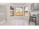 Breakfast nook with beautiful three-window view of the home's exterior at 640 W Country Estates Ave, Gilbert, AZ 85233