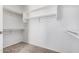 Walk in closet features carpeted floors, and shelving for organization at 640 W Country Estates Ave, Gilbert, AZ 85233