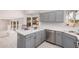 Bright kitchen features quartz countertops, stainless steel appliances, and access to living spaces at 640 W Country Estates Ave, Gilbert, AZ 85233